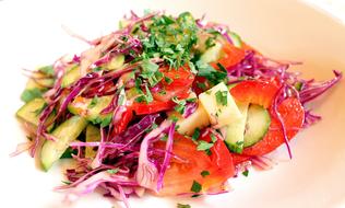 colorful vegetable salad with tomatoes close-up