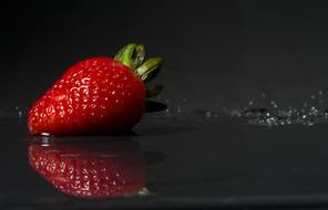 Red Strawberry Fruit on water