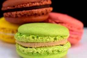 colorful macaroons in blurred background