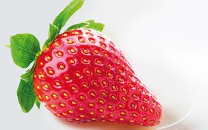 colorful strawberries in white background