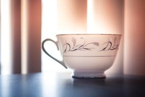 elegant cup with coffee for breakfast