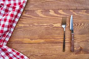 fork knife on a wooden table