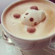 coffee with foam in the shape of a kitten