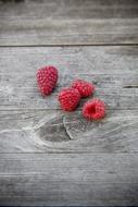 Raspberries Fruits on wood