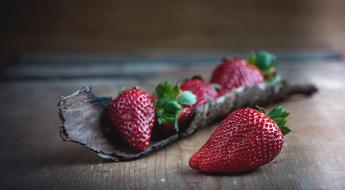 Red Ripe Strawberries on wood