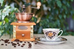 Cup Of Coffee and grinder