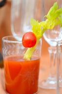 tomato juice and celery stalk