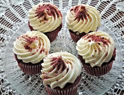 Close-up of the beautiful red velvet cupcakes with red powder