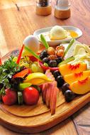 egg and fruit and vegetable plate for breakfast