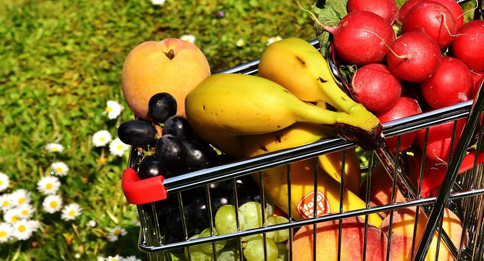 natural ripe fruits in the shopping cart
