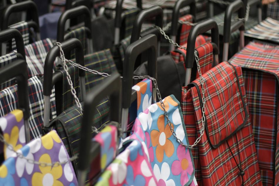 Colorful and beautiful shopping bags, connected with chains