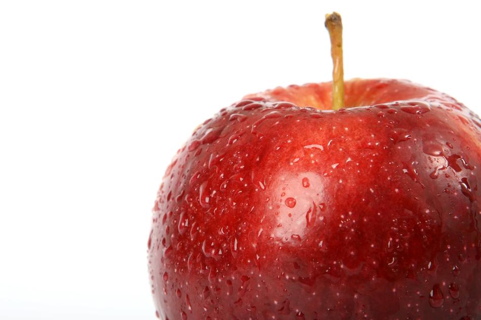 top of wet red Apple close up