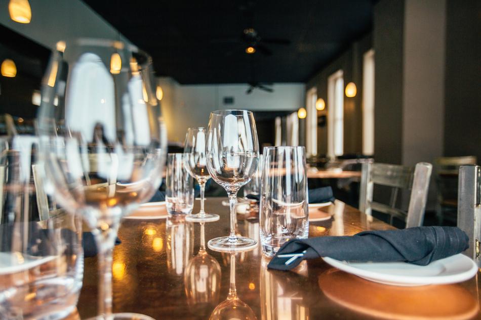variety of glasses on the table in the restaurant