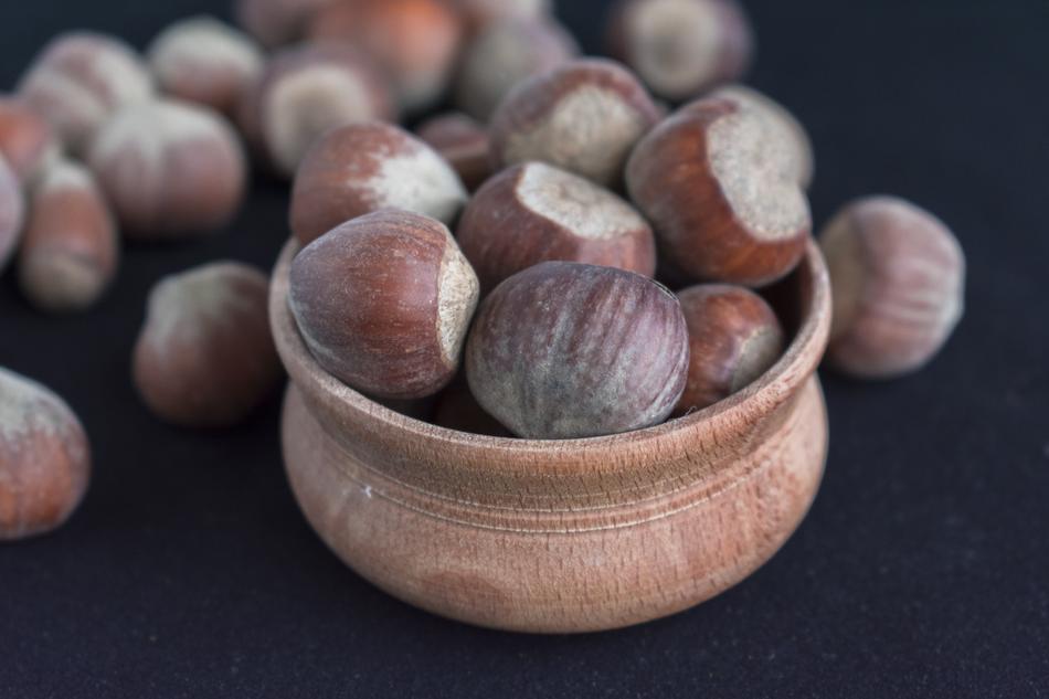 Close-up of the beautiful, brown chestnuts and bowl