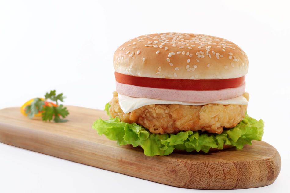 cheeseburger with sausage, close-up