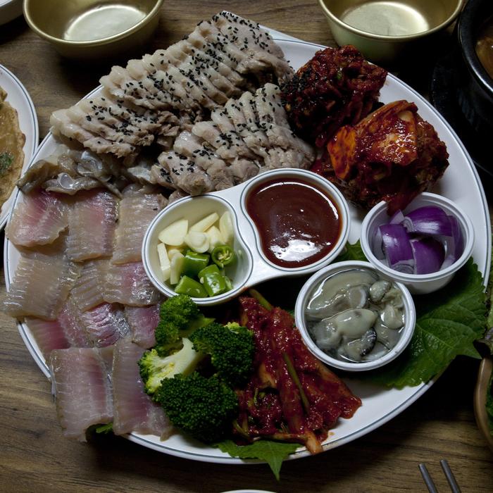 Colorful, different traditional food of Republic of Korea, on the white plate