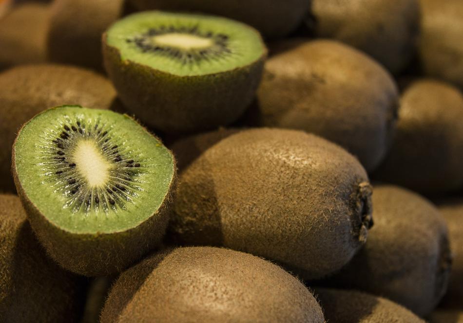 Beautiful, cut and hole kiwis in light and shadows