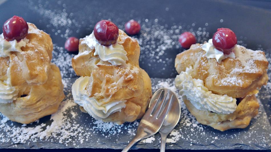 buns with cream and red berries