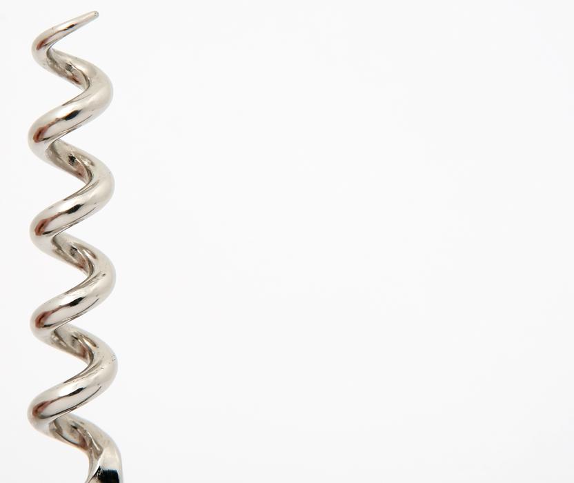 metal corkscrew on white background
