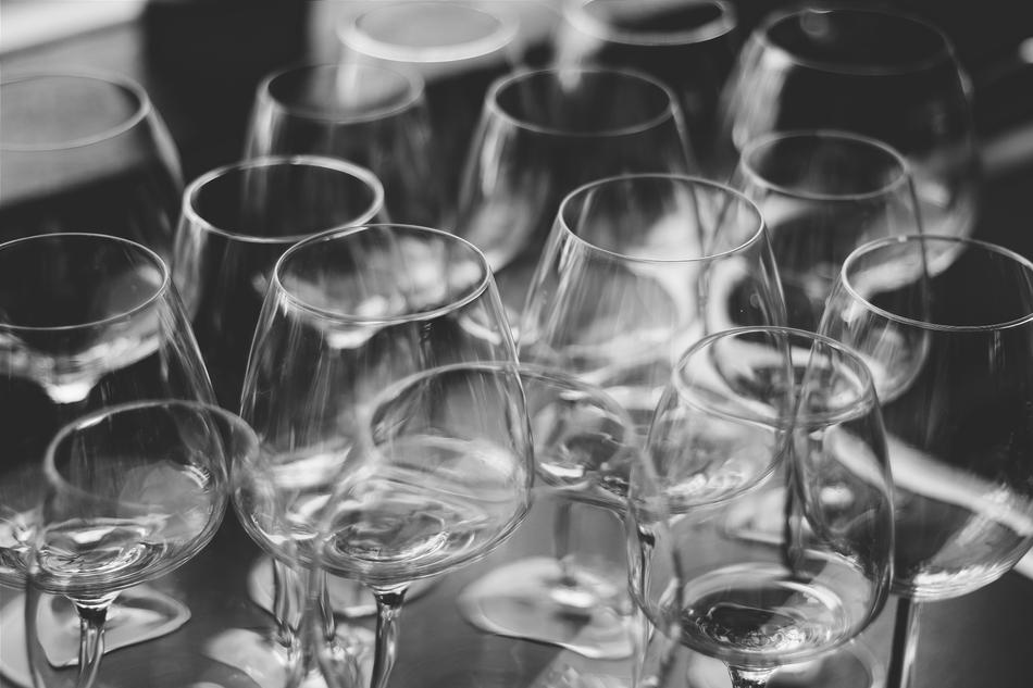 empty glasses in black and white blurred background