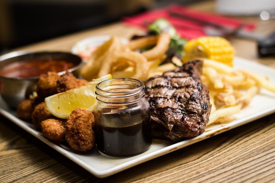 grilled Meat and vegetables on table