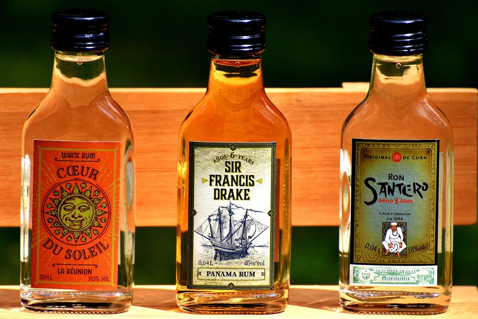 Beautiful and colorful, shiny bottles of rum, with patterns