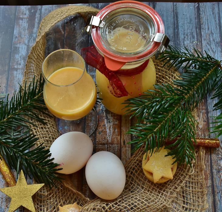 christmas composition with eggs and drink
