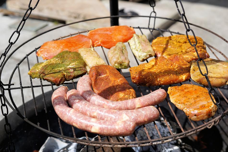 various Meats on grill over fire