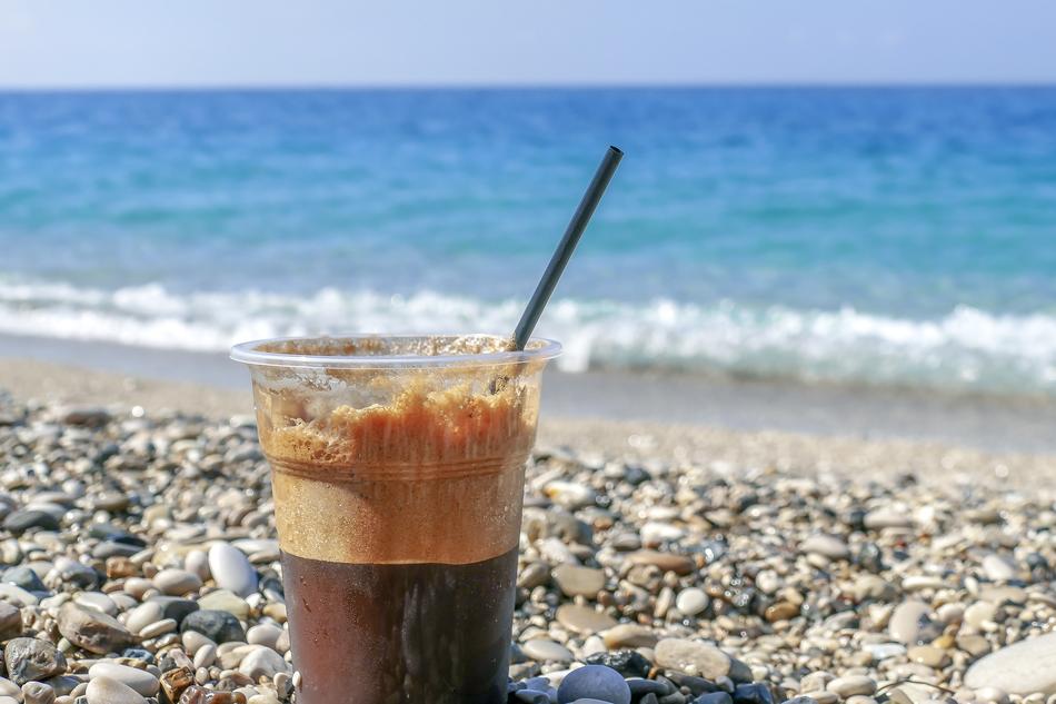 Coffee glass on Sea beach