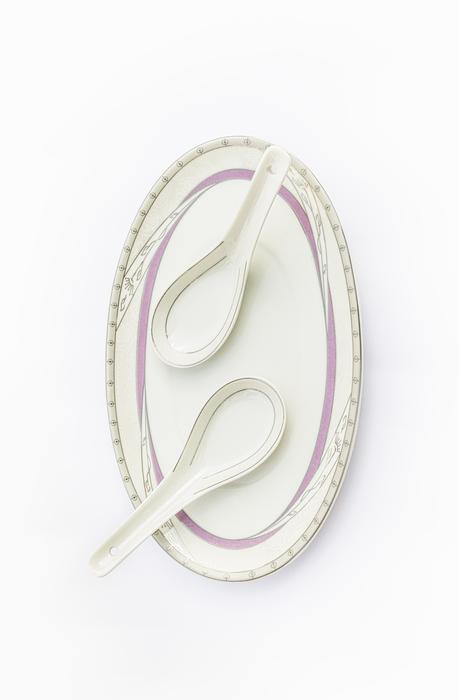 Kitchen icon with spoons on the plate, at white background, clipart