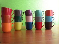 stacks of multicolored coffee cups