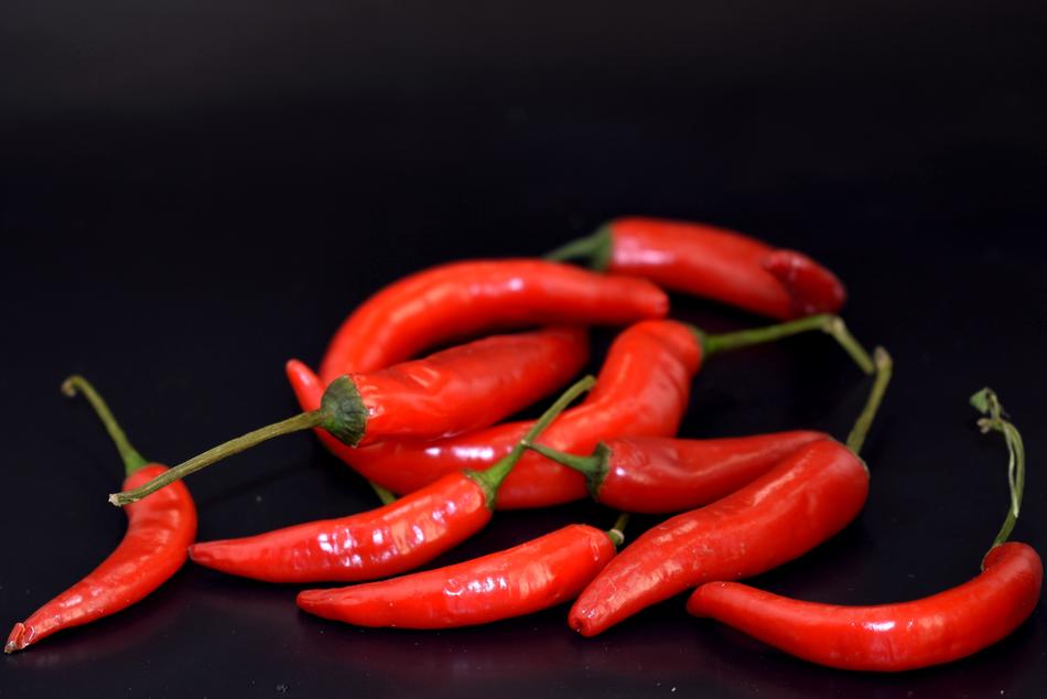 chili pepper on black background