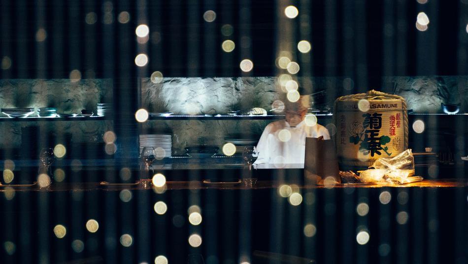 bokeh picture of chef on kitchen