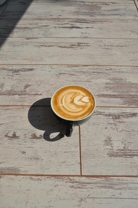 cup of coffee on the pier