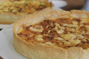 Yellow pie on a white plate