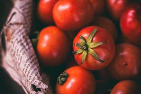 Red tomatoes in the newspaper
