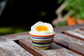 Boiled egg in a cup