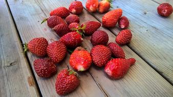 scattered strawberries on floor