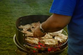 man cooking Meat on Grill, Barbecue