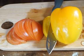 slicing vegetables on board