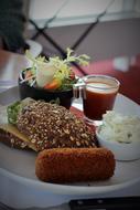 Perfect lunch with salad and scones with sauce