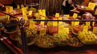 Stall with olives, onions and other vegetables