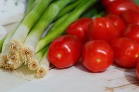 Onion and tomato on the table