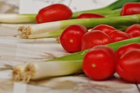 Red ripe tomatoes and onions