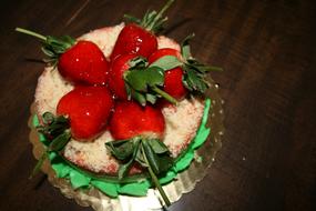 Small cake with big strawberries