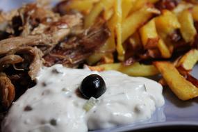 meat with potatoes and sauce