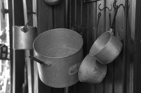 iron pots on wall