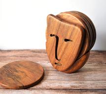 male face, rustic wood carving