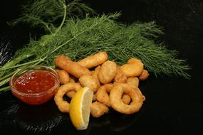 appetizers with lemon and sauce