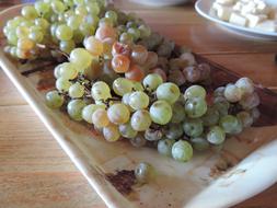 sweet grapes on table